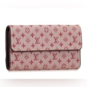 Louis Vuitton Monogram Mini Lin Porte Tresor
International Long Wallets